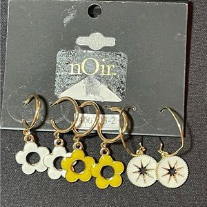 103 –Noir set of three gold tone, hoop earrings with enamel charms